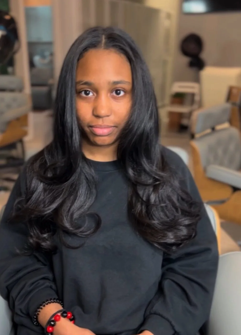 Silk press on natural textured hair with smooth roots and polished ends at Healthy Hair Care First in Dallas, Texas.